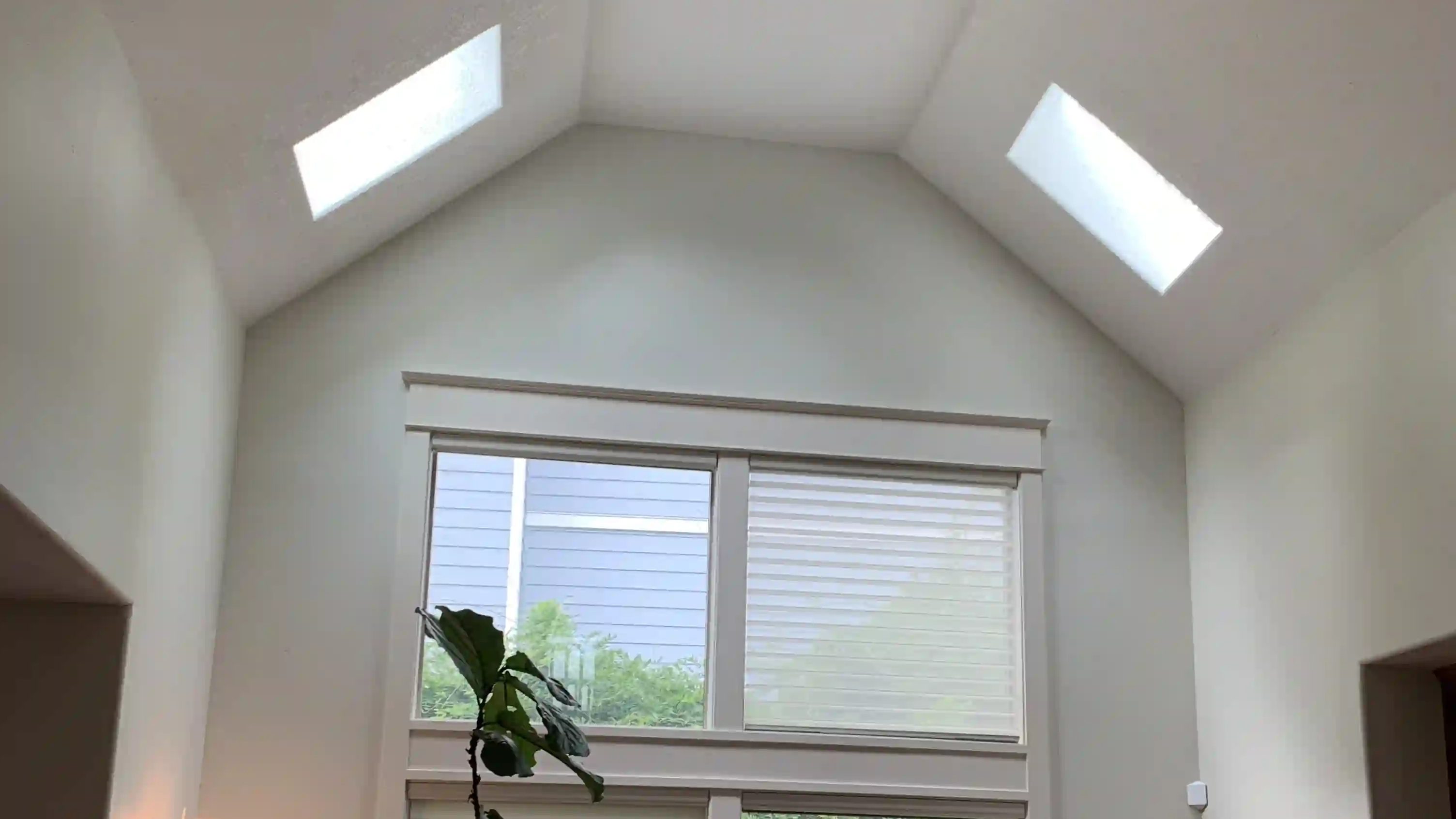 Twoskylights in foyer of a home.